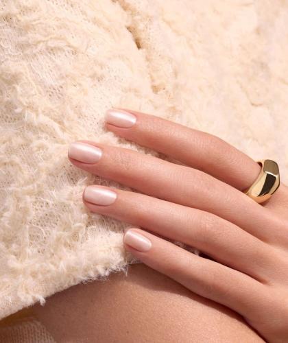 Manicure with Pearlescent GREEN™ Manucurist nail polish, pearlescent beige with pink undertones