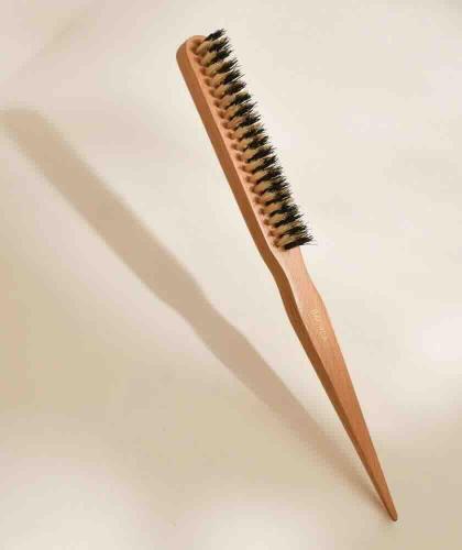 BACHCA Paris Slick Back Hairbrush in beech wood with natural boar bristles on a beige background