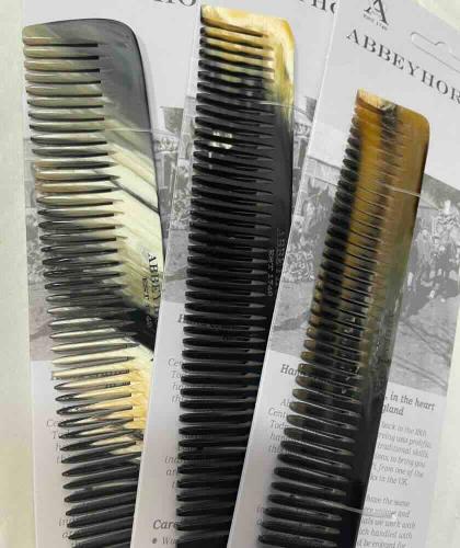 Three ABBEYHORN wide-tooth horn combs handcrafted in England, each with unique natural colours and marbling