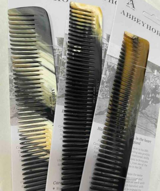 Three ABBEYHORN wide-tooth horn combs handcrafted in England, each with unique natural colours and marbling